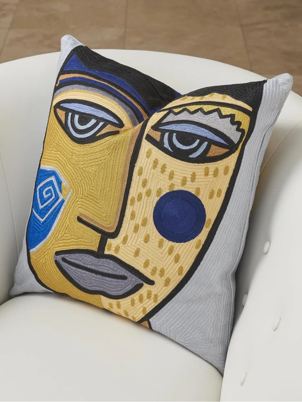Global Views Abstract Face Accent Pillow in Yellow, Blue, Black, Gray